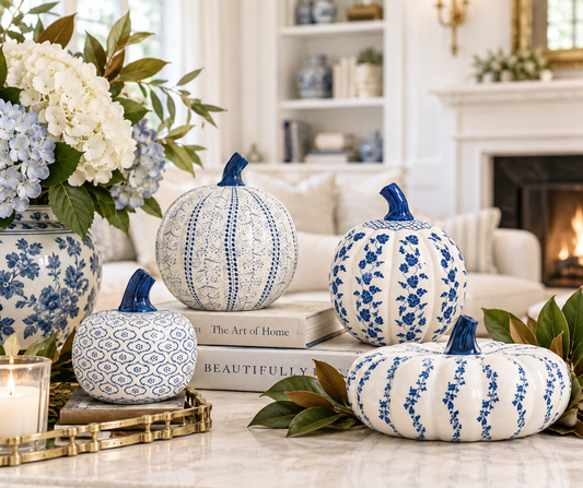 a group of blue and white pumpkins