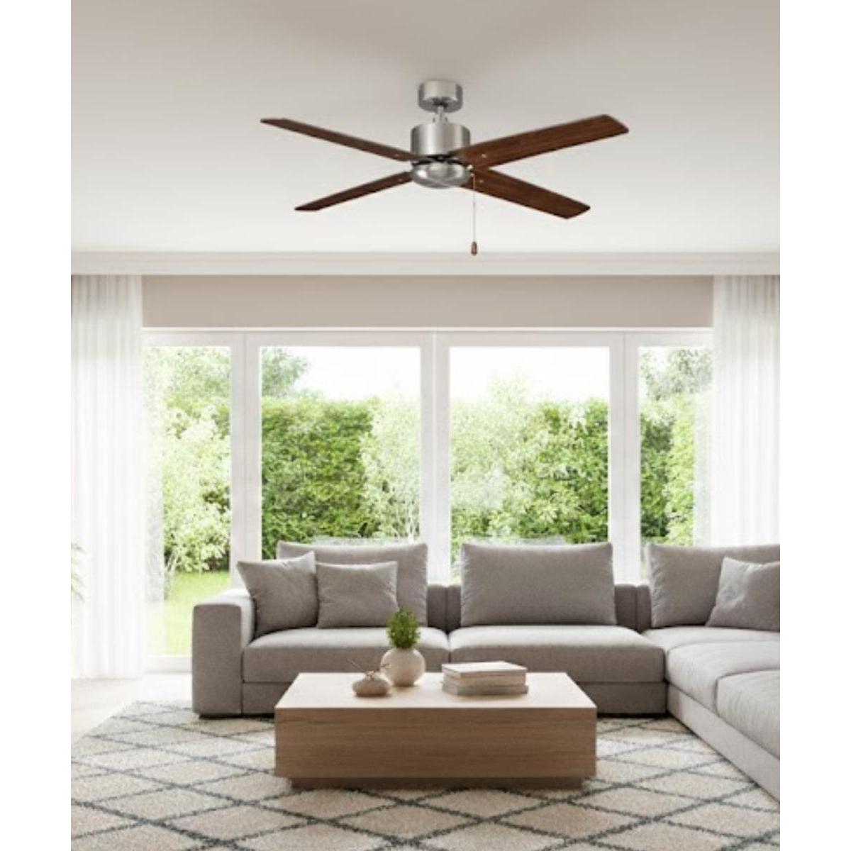a living room with a couch and a fan