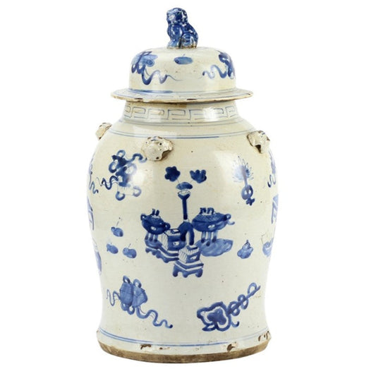 a white and blue vase