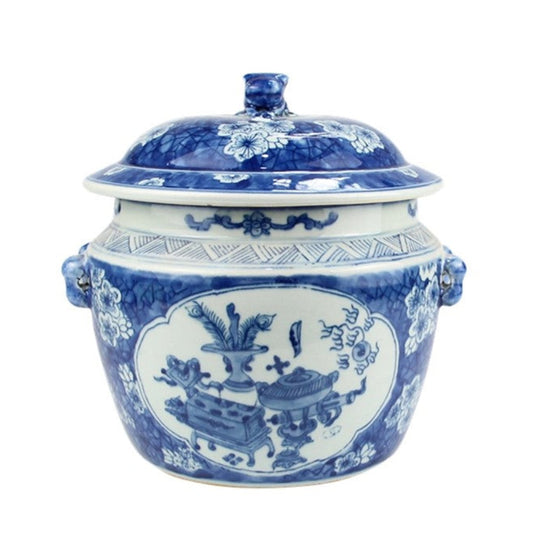 a blue and white ceramic pot with a lid