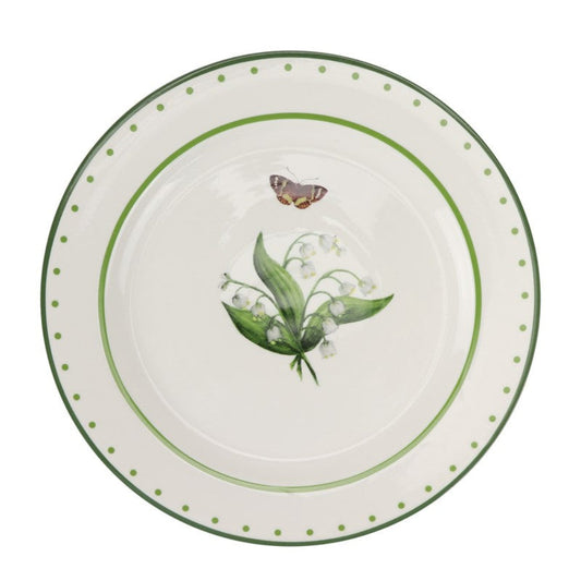 a plate with a butterfly and flowers on it