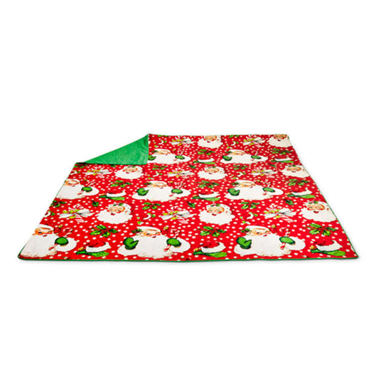 a blanket with santa claus design