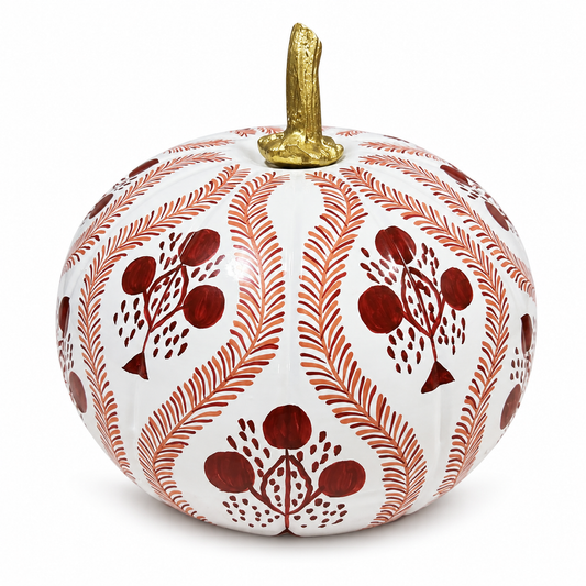 a white and red pumpkin