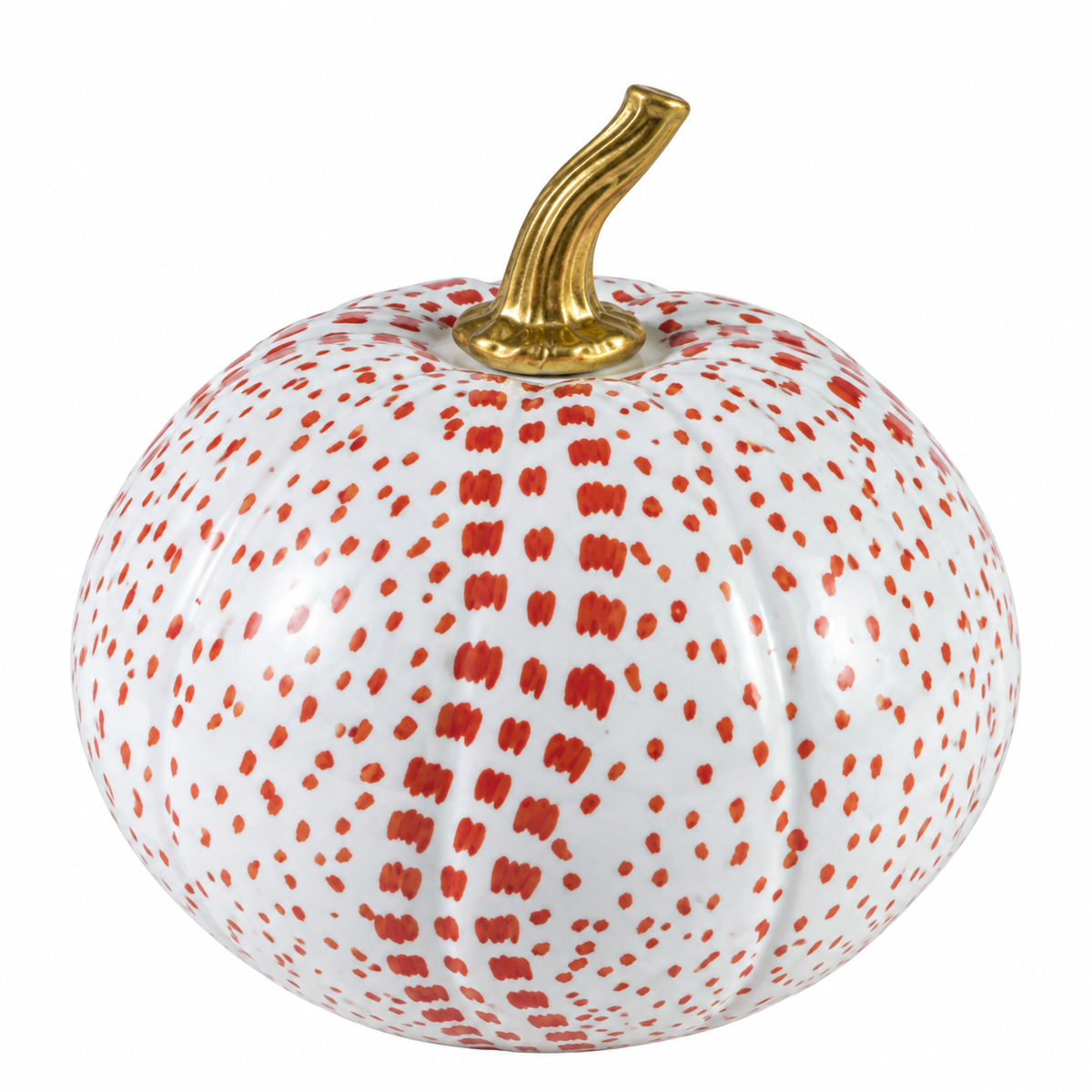 a white and red pumpkin with a gold stem