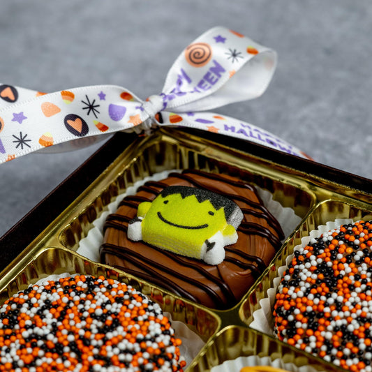 a box of cookies with a bow