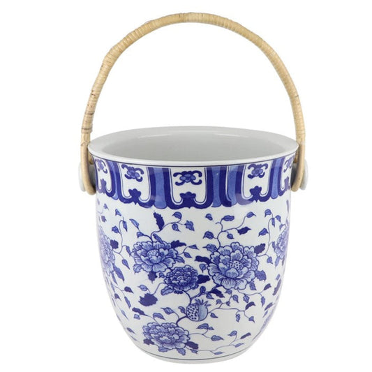 a blue and white painted bucket
