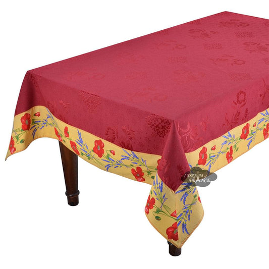 a red and yellow table cloth with flowers on it