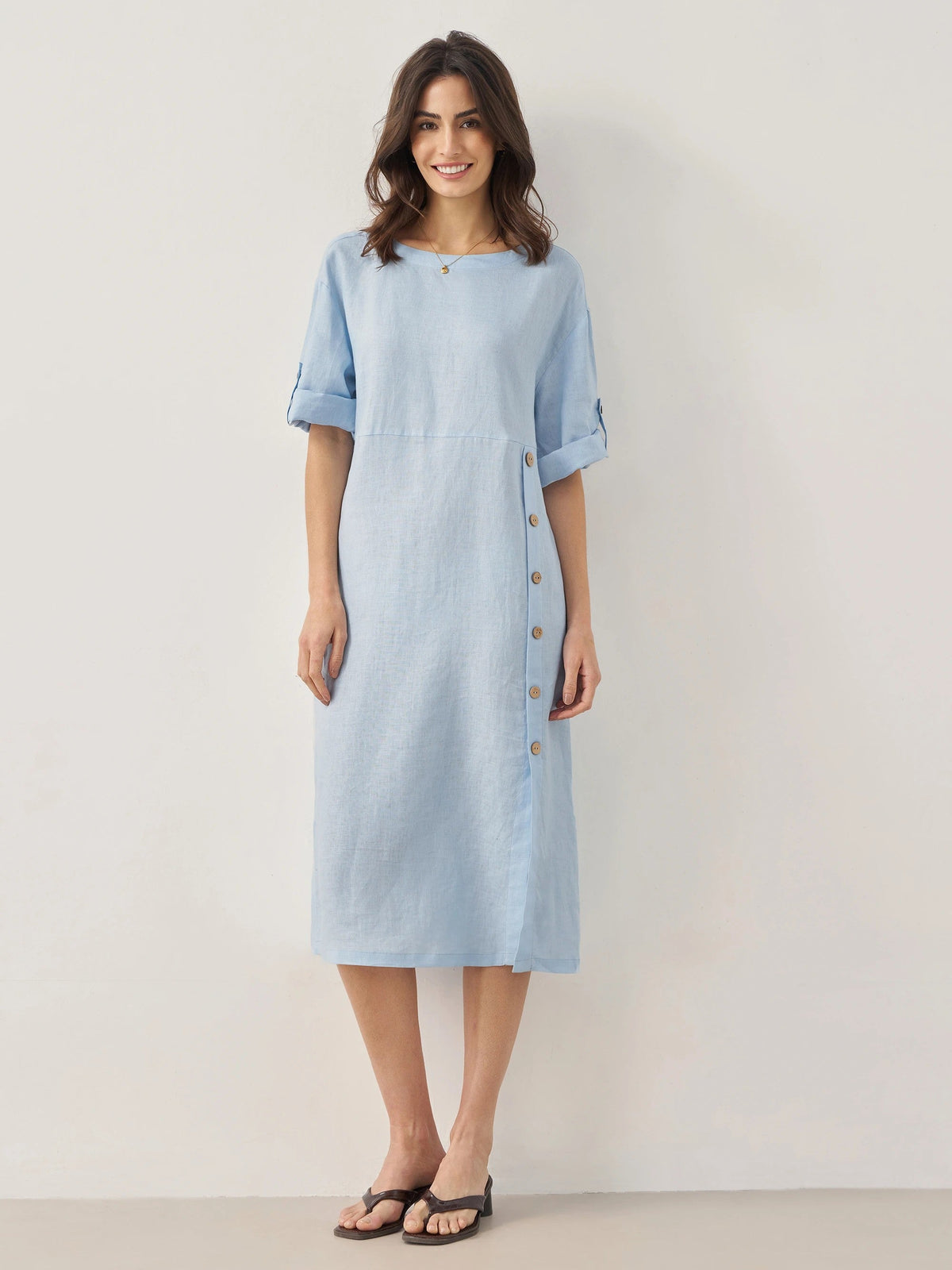 a woman in a blue dress