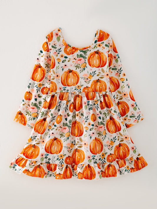 a dress with pumpkins on it
