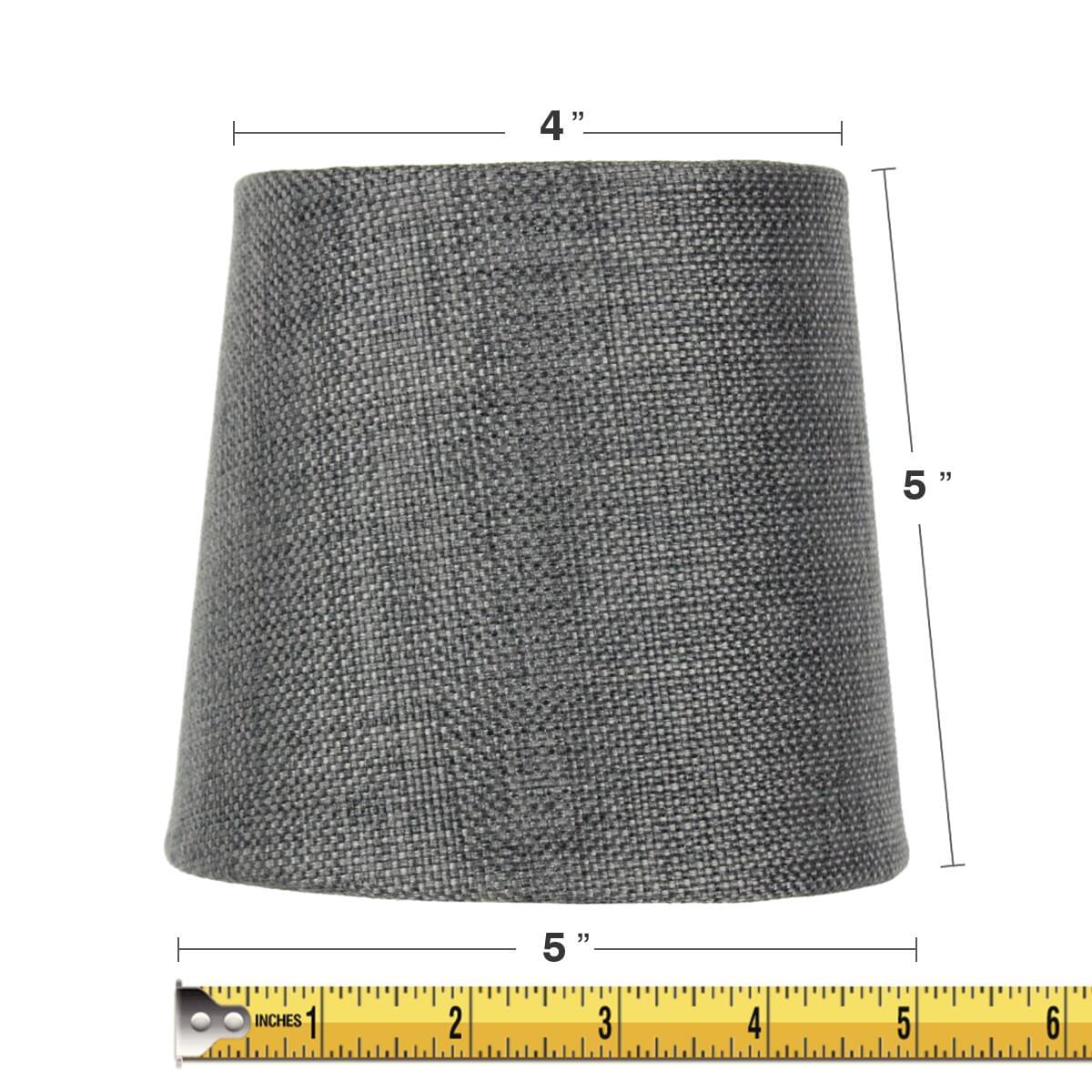 a grey fabric cylinder with measuring tape