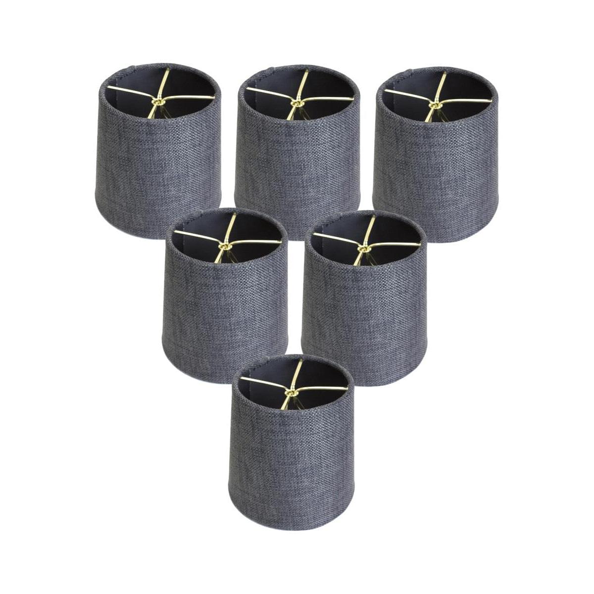 a group of lampshades with a yellow cord