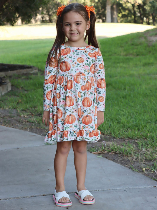 a girl standing on a sidewalk