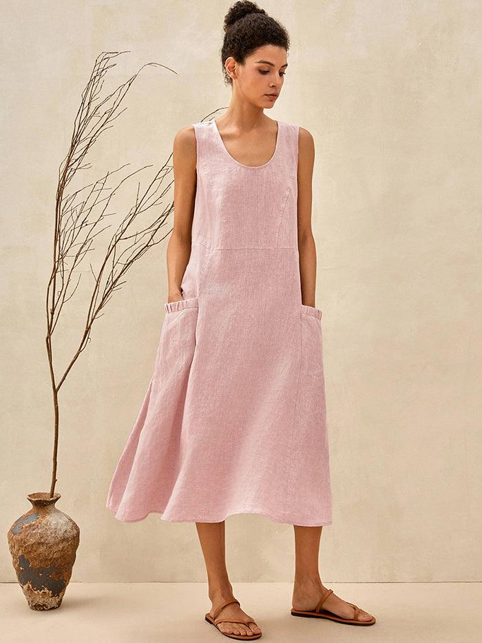 a woman in a pink dress