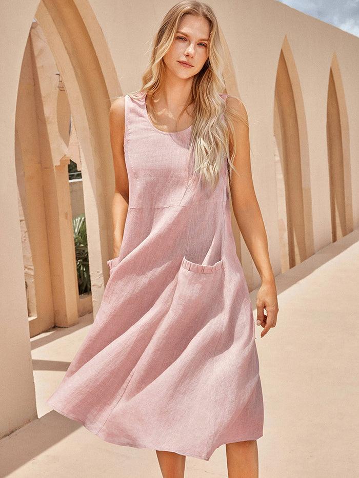 a woman in a pink dress