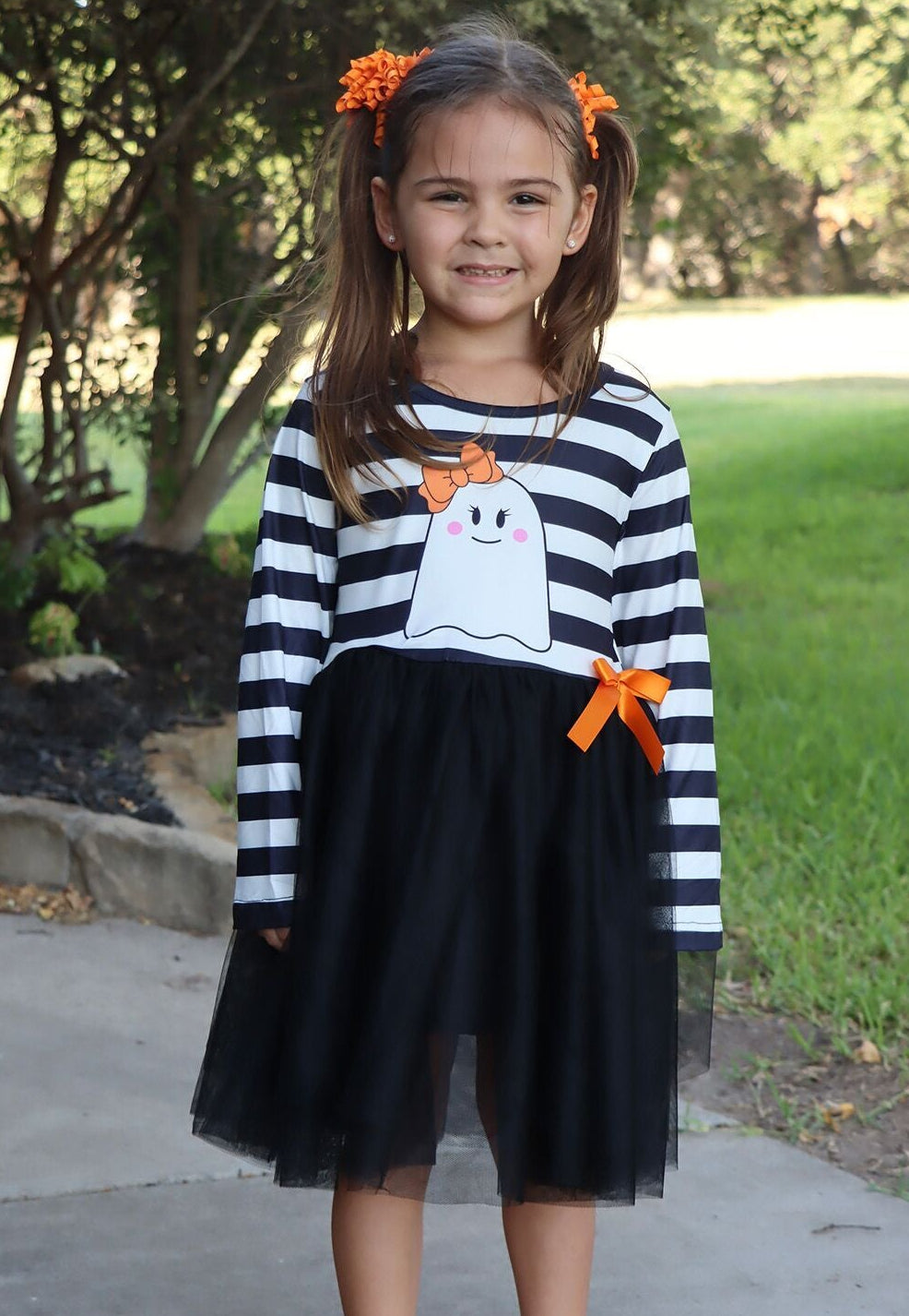 a girl in a striped shirt