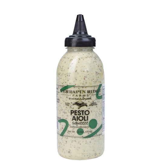 a bottle of sauce with a black cap