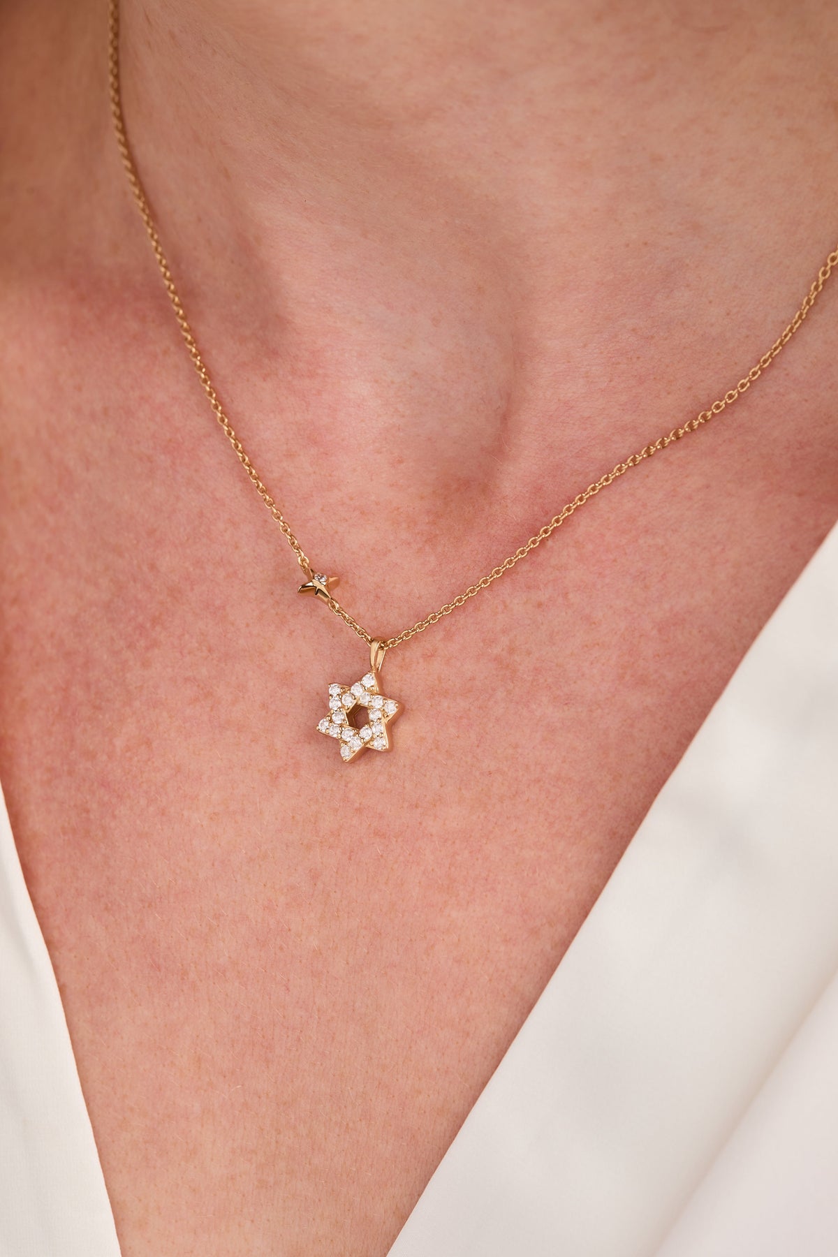 a person wearing a necklace