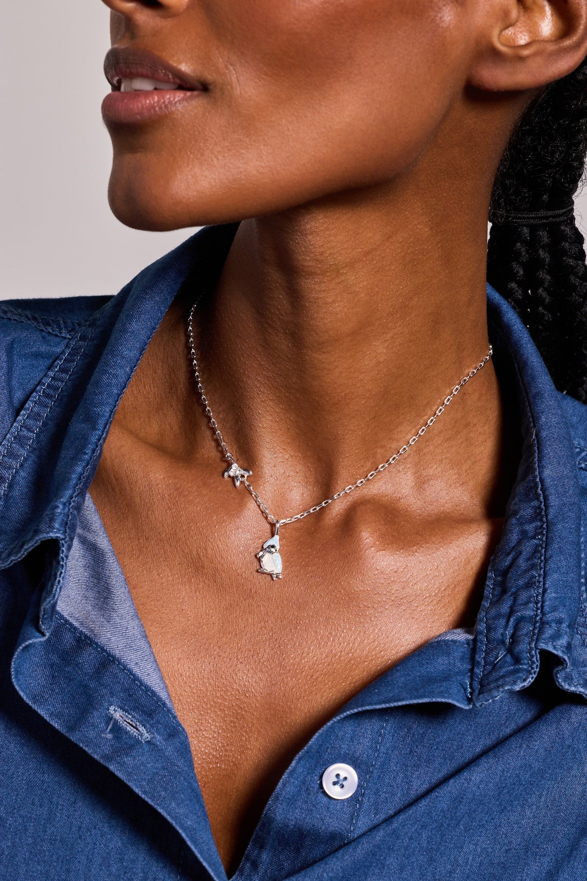 a woman wearing a necklace