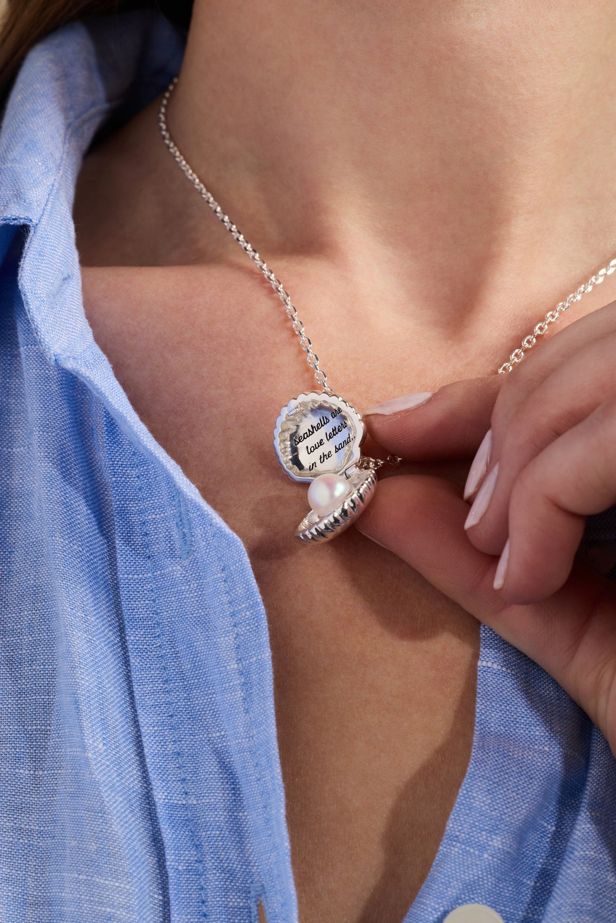 a woman wearing a necklace