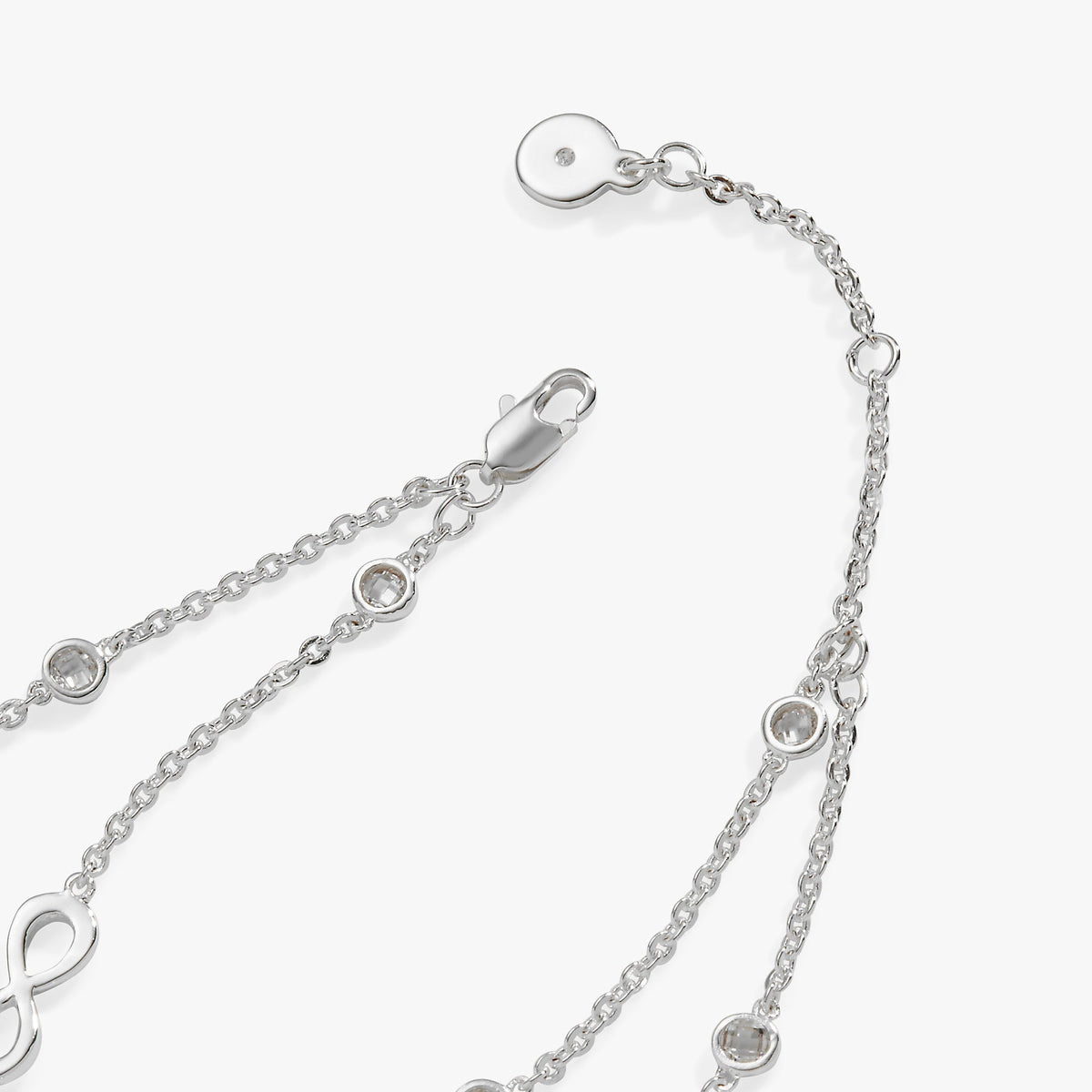 a silver chain with diamonds
