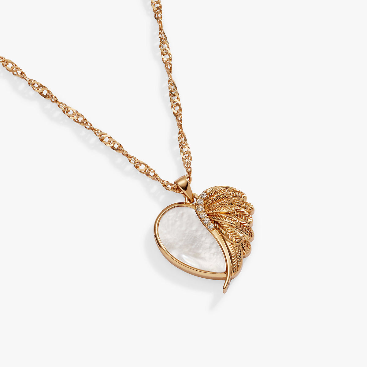 a gold necklace with a heart shaped pendant