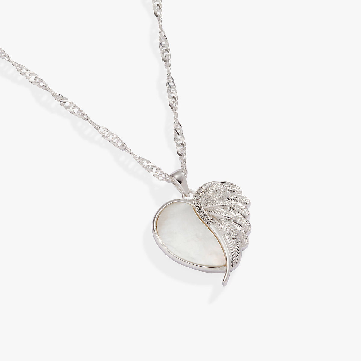 a silver necklace with a heart shaped pendant