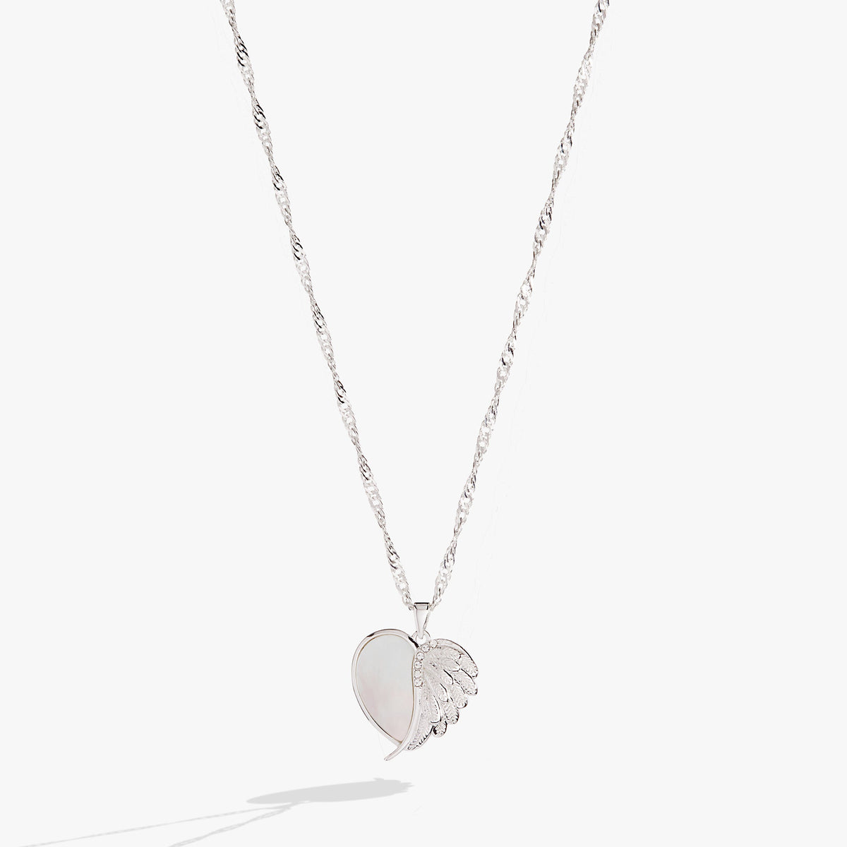 a silver necklace with a heart pendant