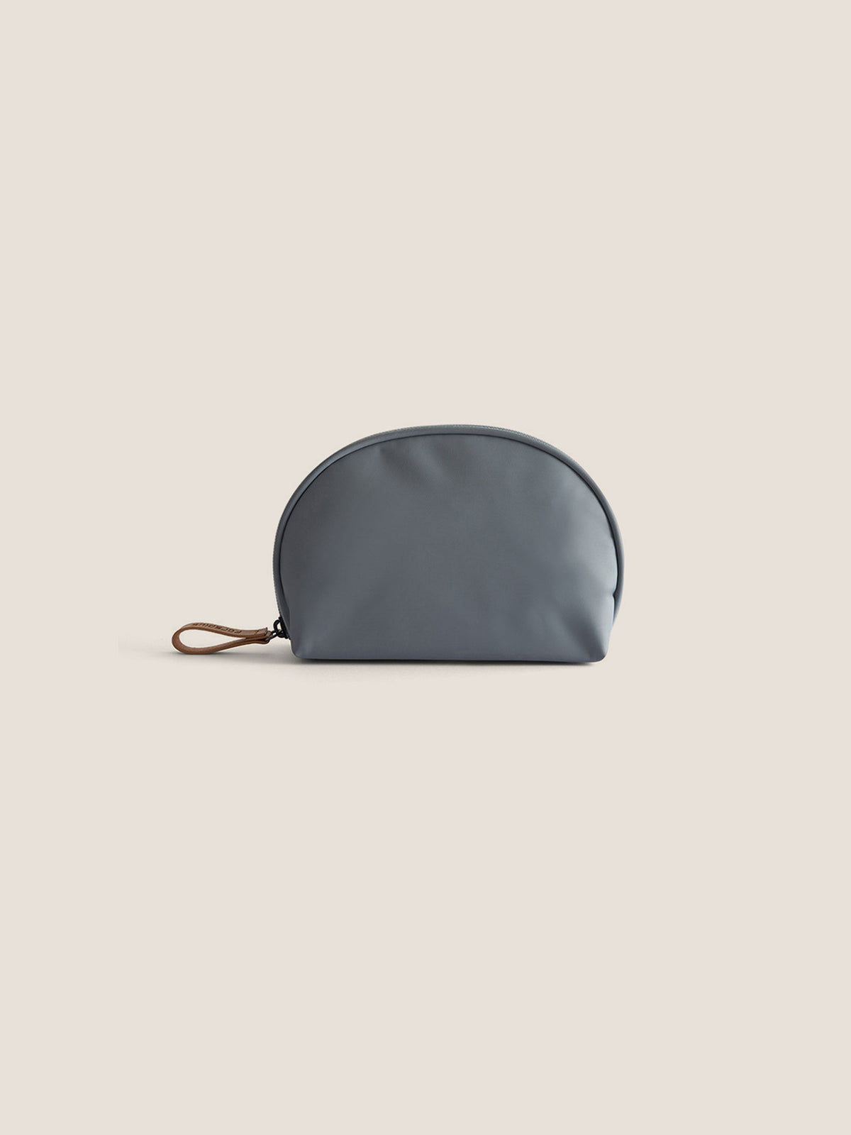 a grey pouch with a brown handle