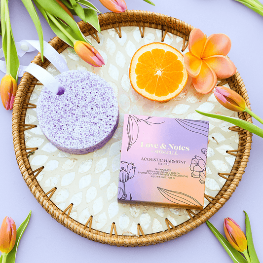 a basket with orange slices and flowers
