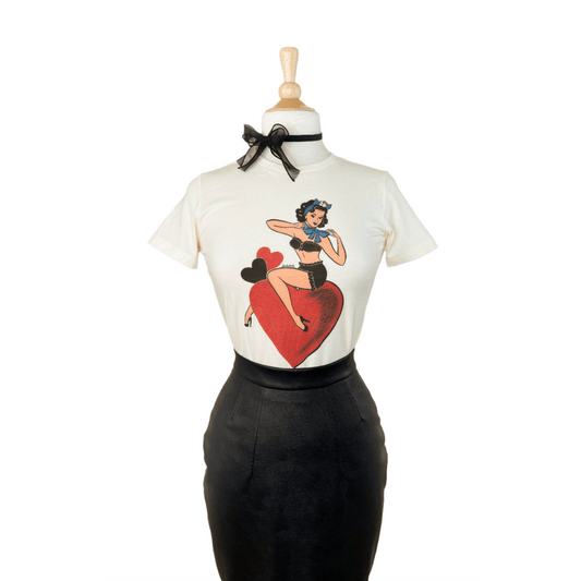 a white shirt with a red heart on it