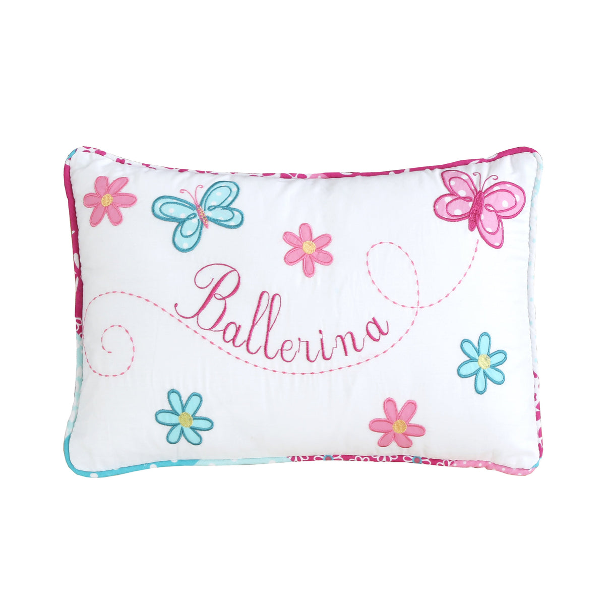 a white pillow with pink and blue butterflies and flowers