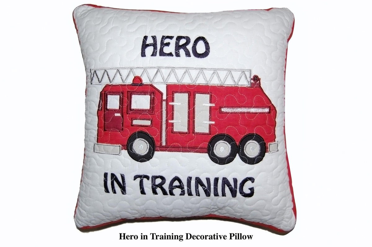 a pillow with a firetruck on it