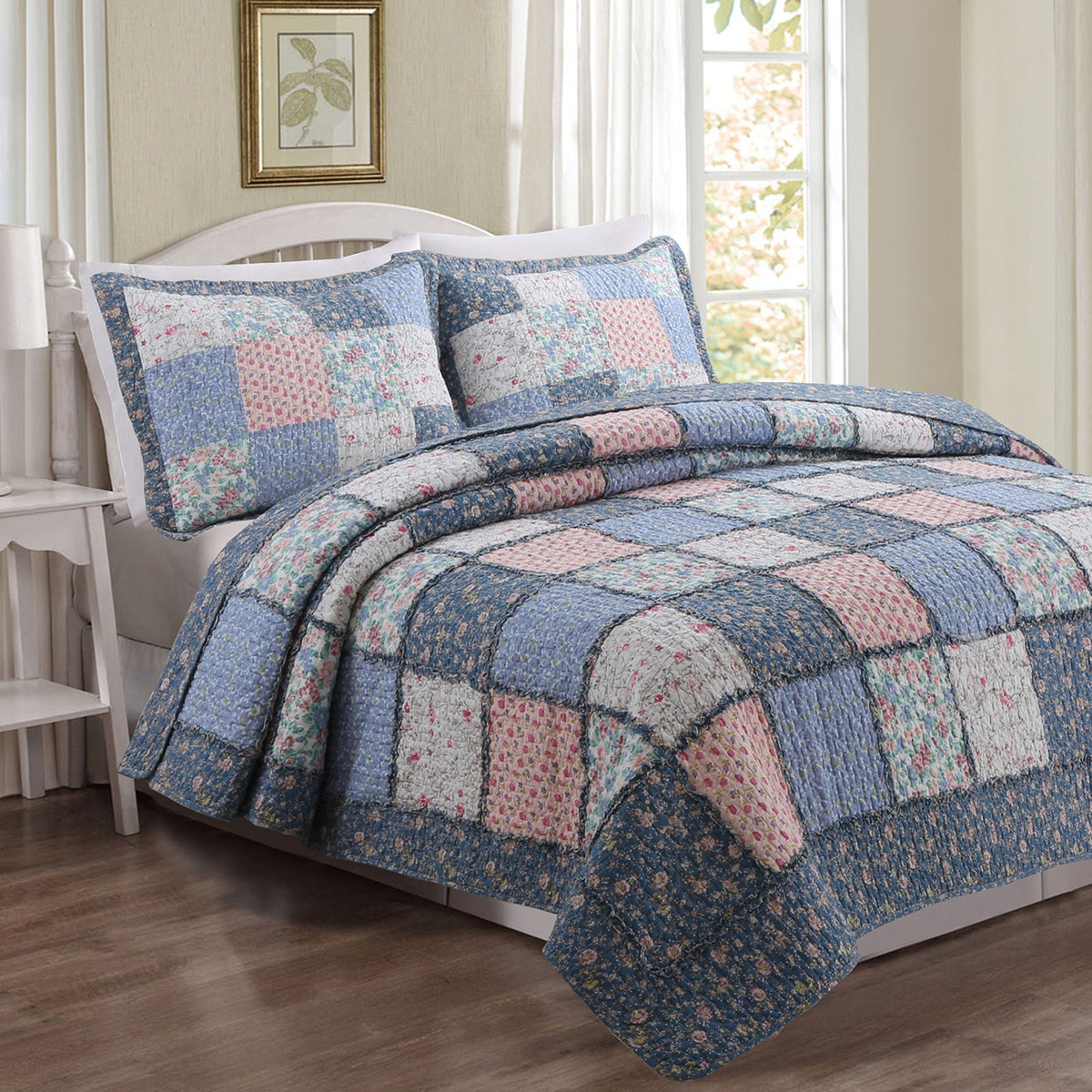 a bed with a quilt