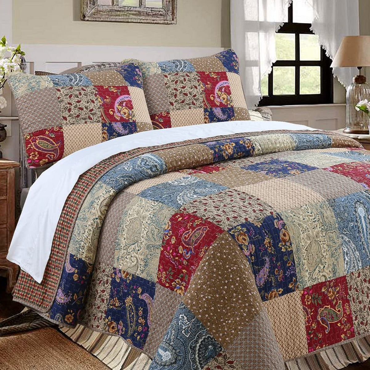 a bed with a quilt