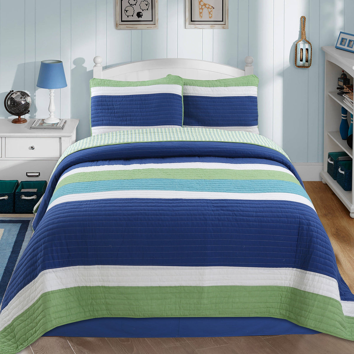 a bed with a striped bedding