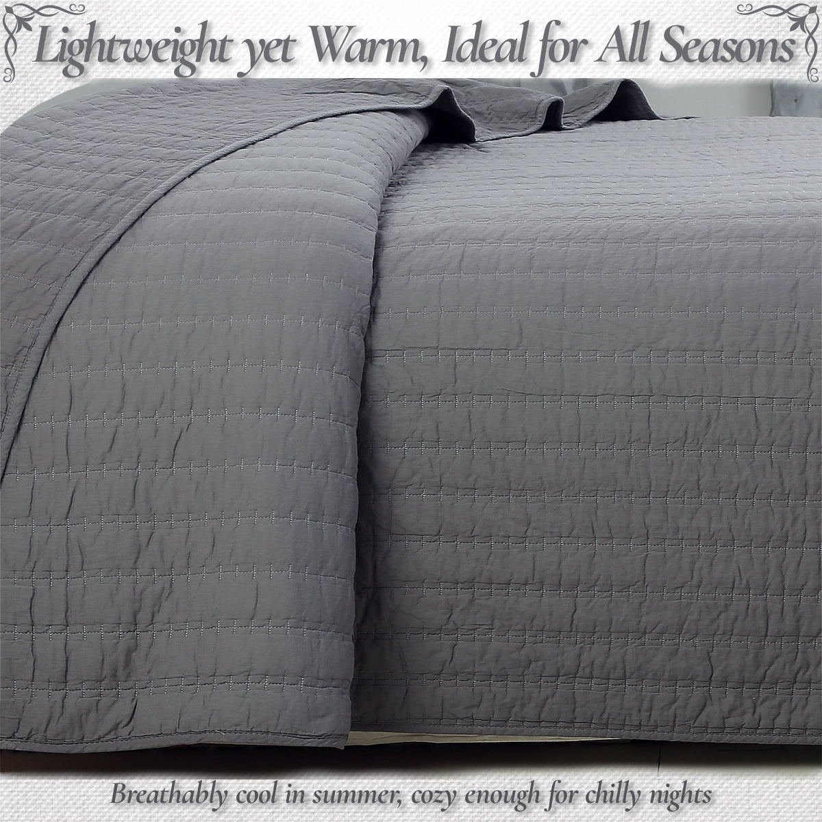 a grey blanket on a bed