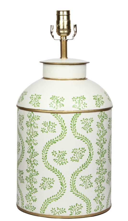 a white and green container with a gold top