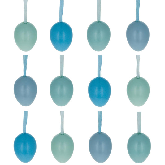 a group of blue and green eggs