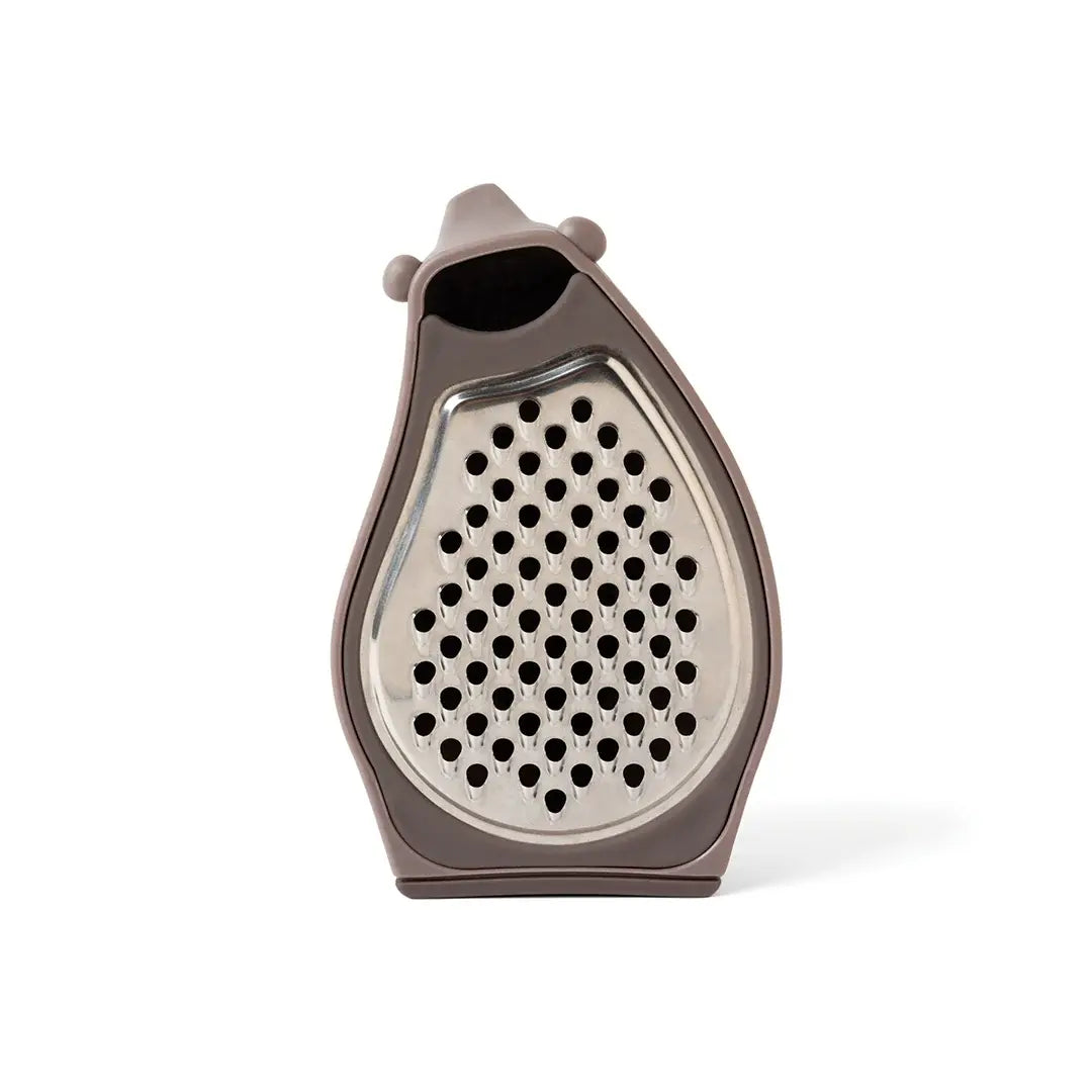 a cheese grater on a white background