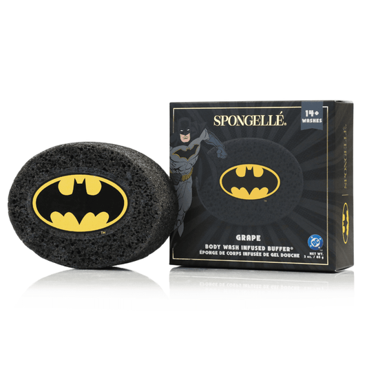 a black sponge with a yellow logo on it next to a box