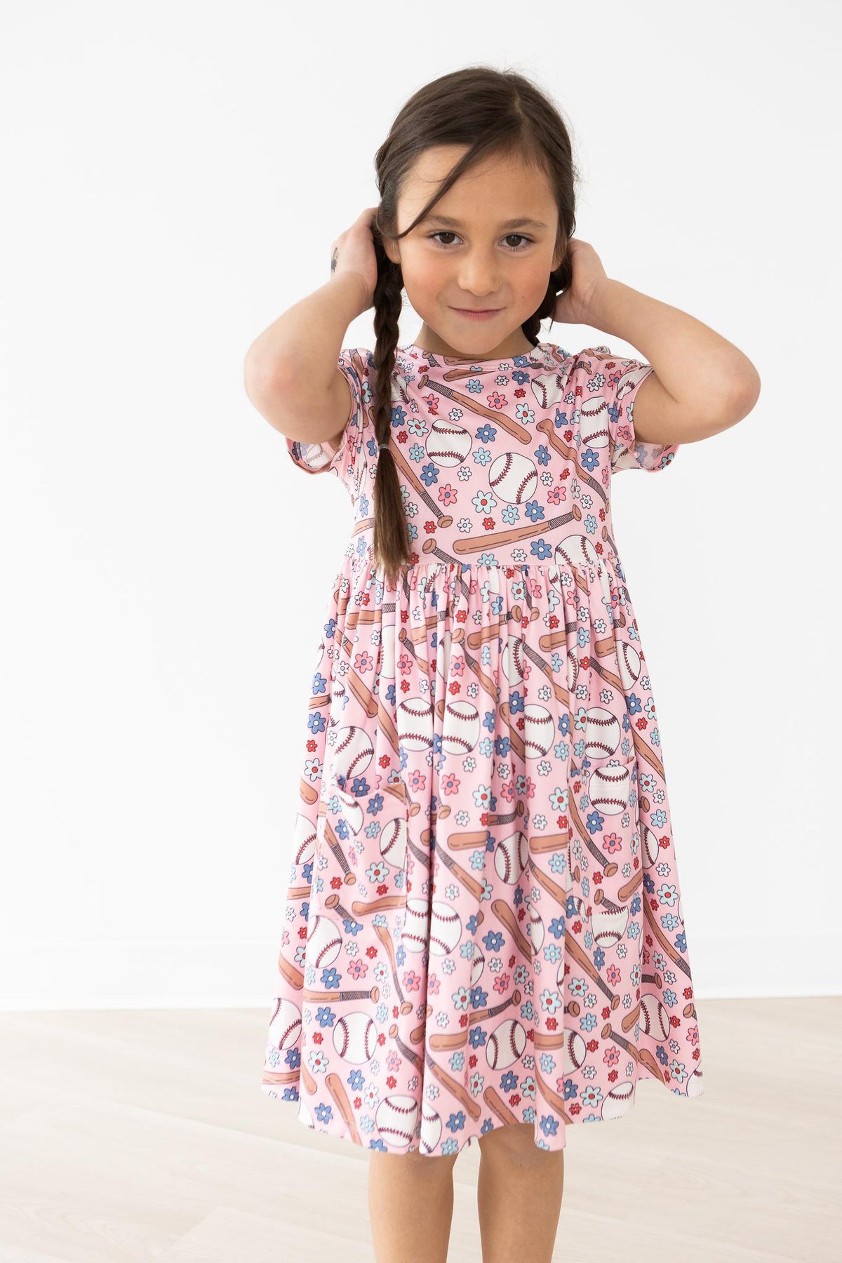 a girl holding her hair