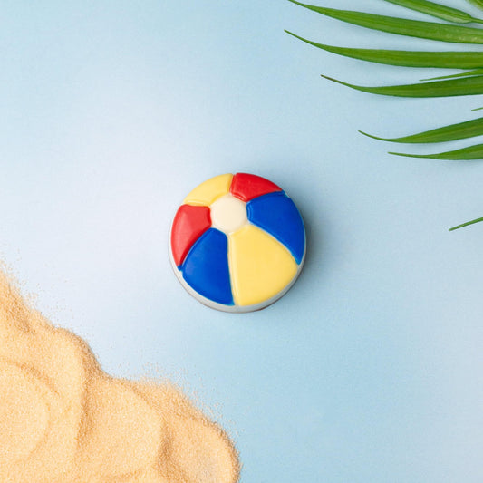 a beach ball and sand