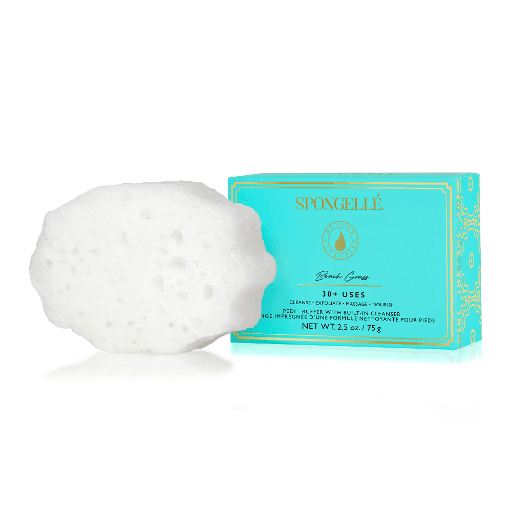 a white sponge next to a blue box
