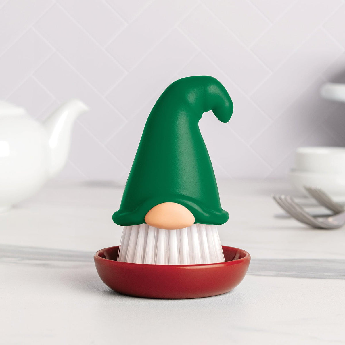a small gnome shaped toothpick holder