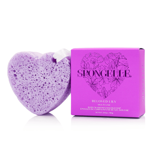 a purple heart shaped sponge next to a box