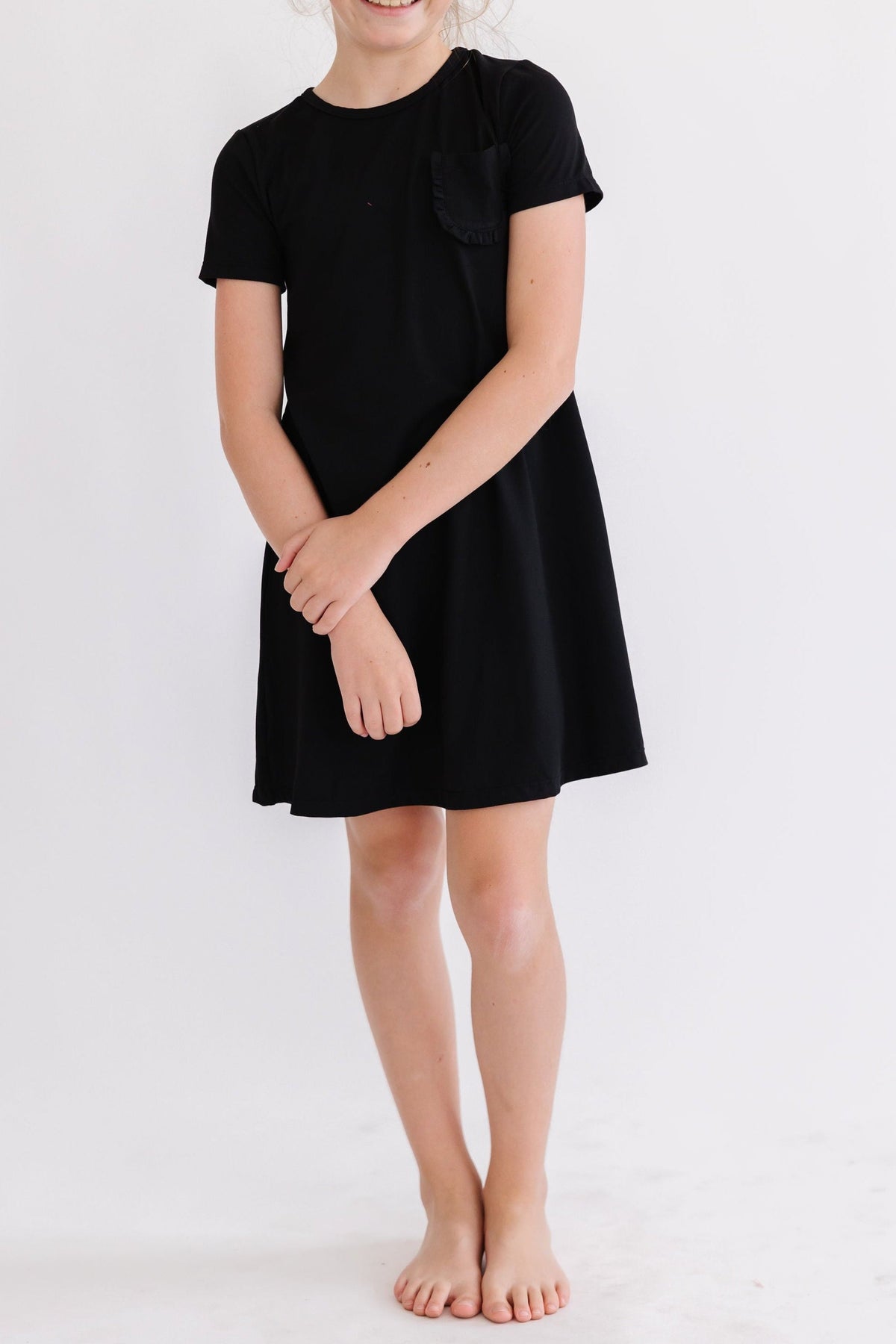 a woman in a black dress