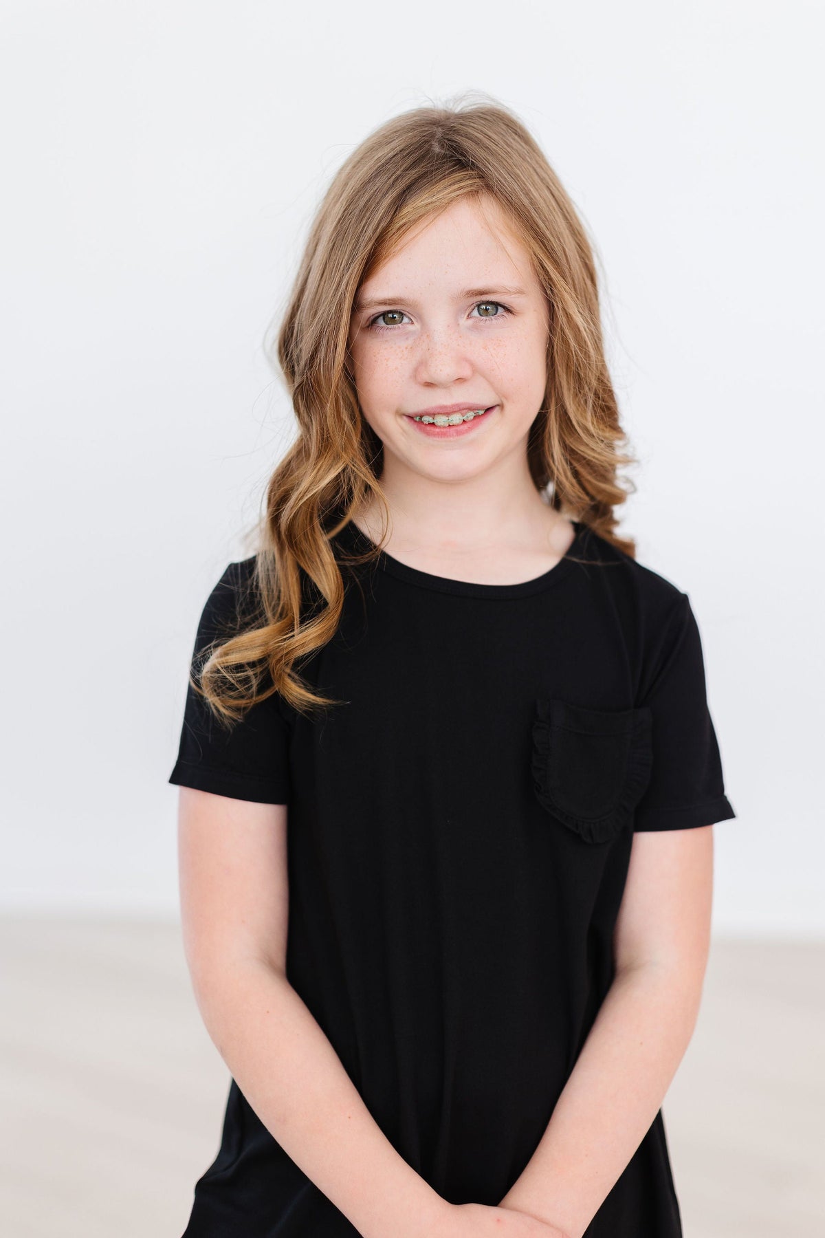 a girl in a black shirt