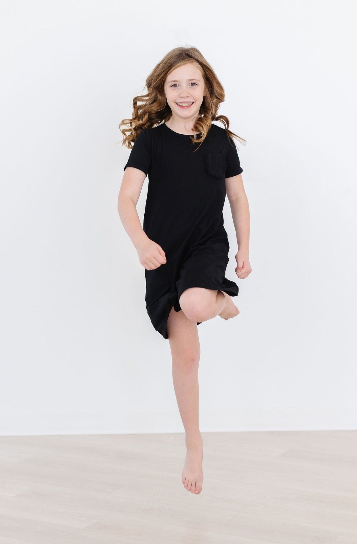 a girl in a black dress