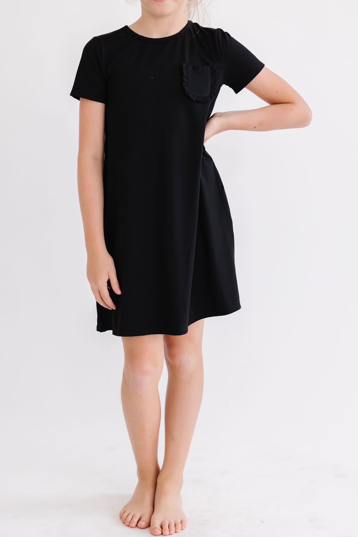 a woman in a black dress