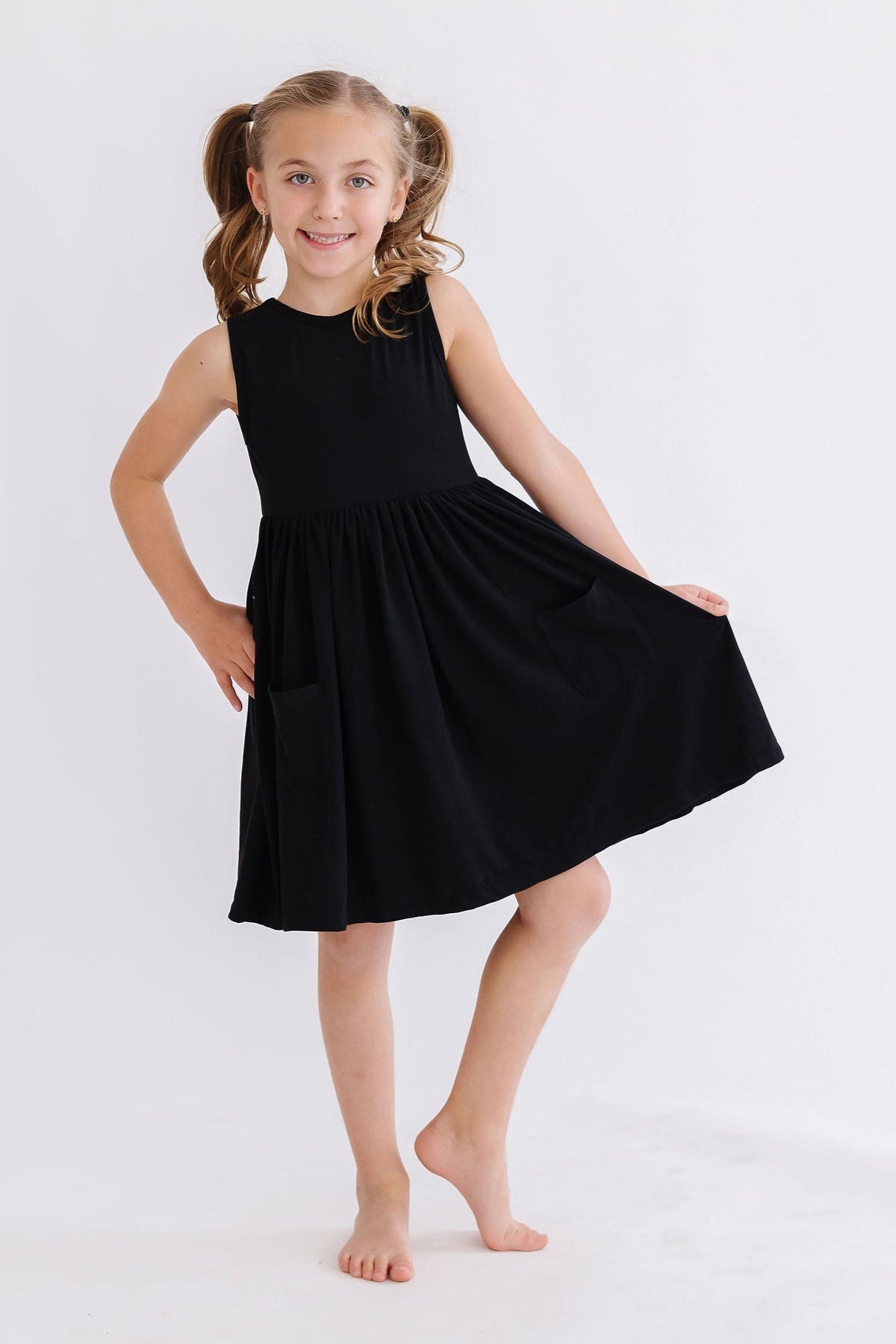 a girl in a black dress